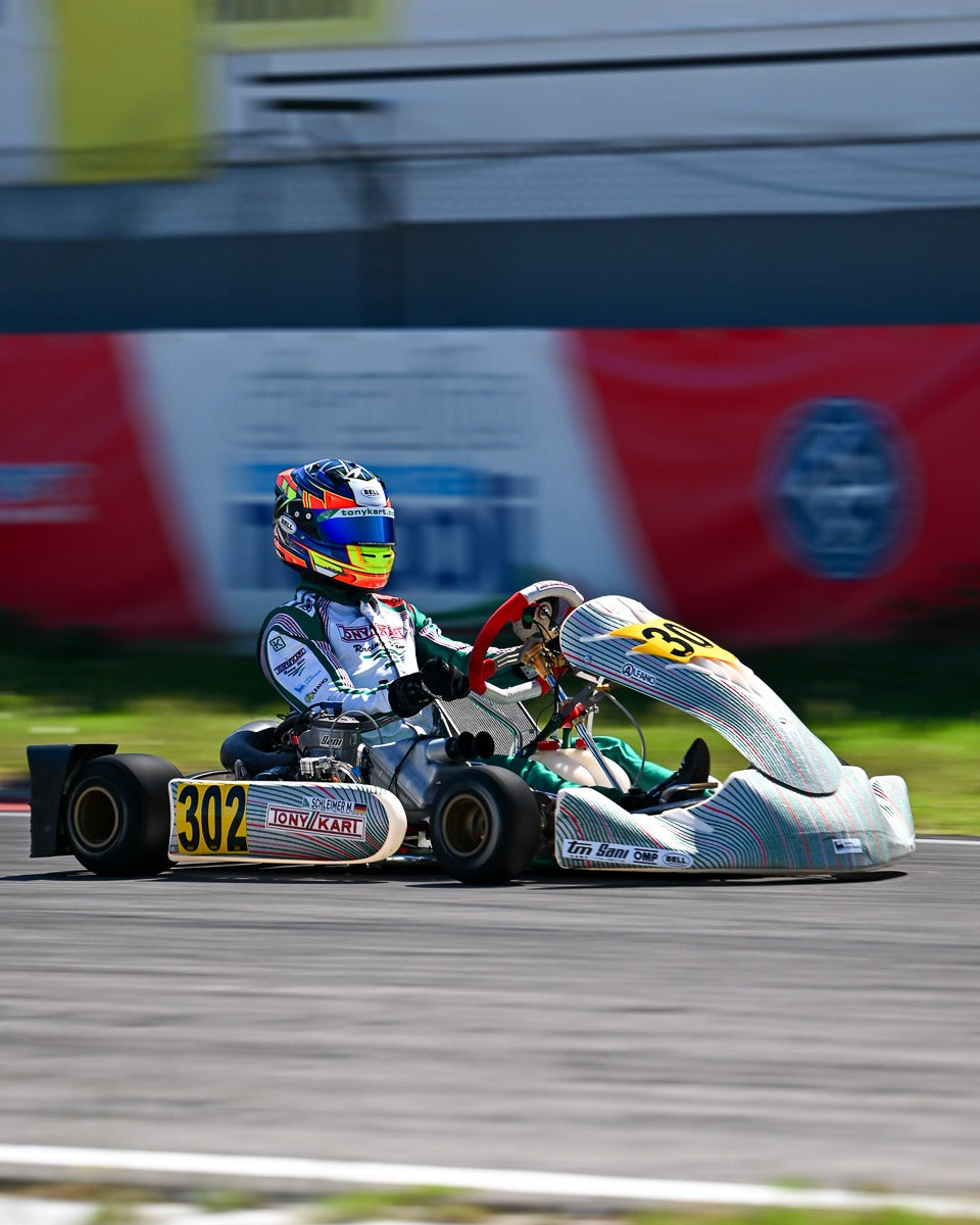 Tony Kart driver racing on track in a Tony Kart chassis
